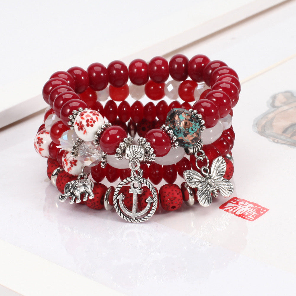 B664 Conjunto de pulseras cuencas rojas aleacion elasticas