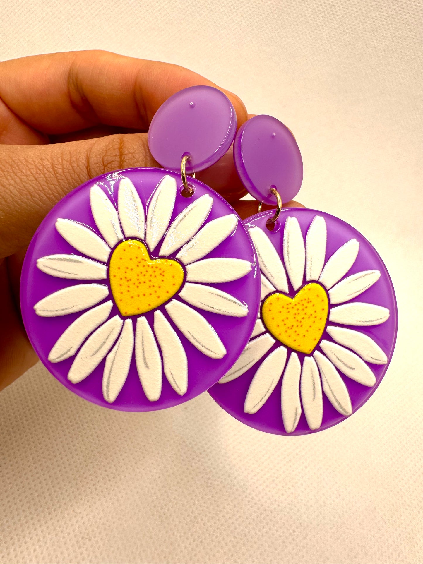 E42 Aretes Morados Girasol