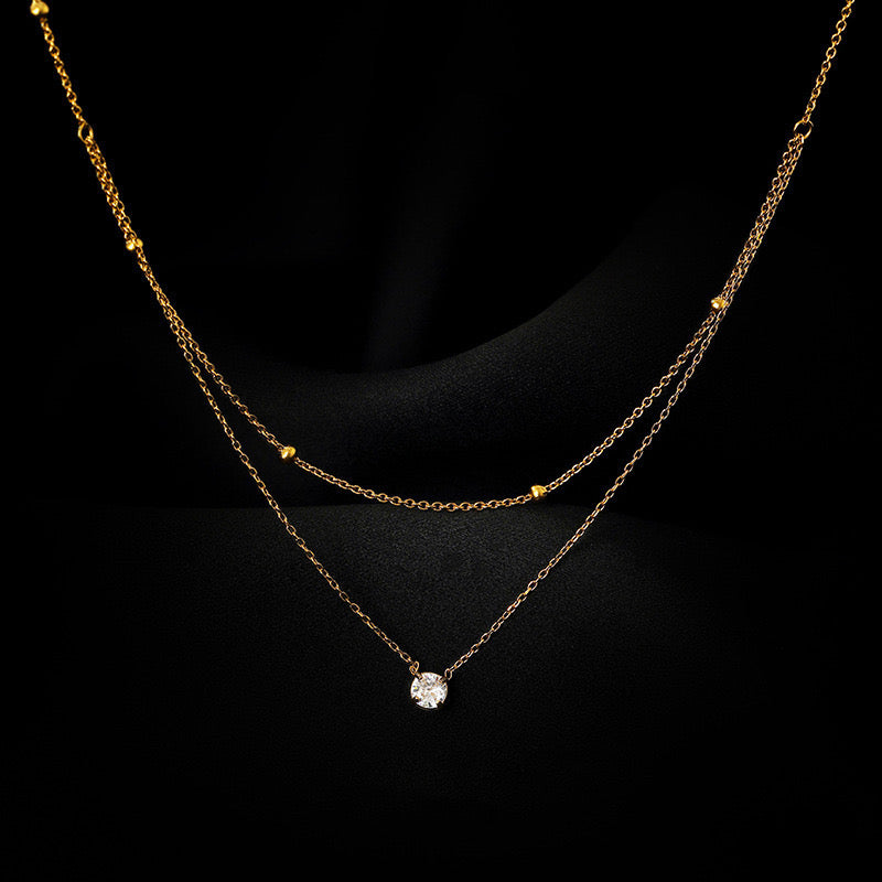 C1533 Collar dorado doble cristal acero de titanio 24cm