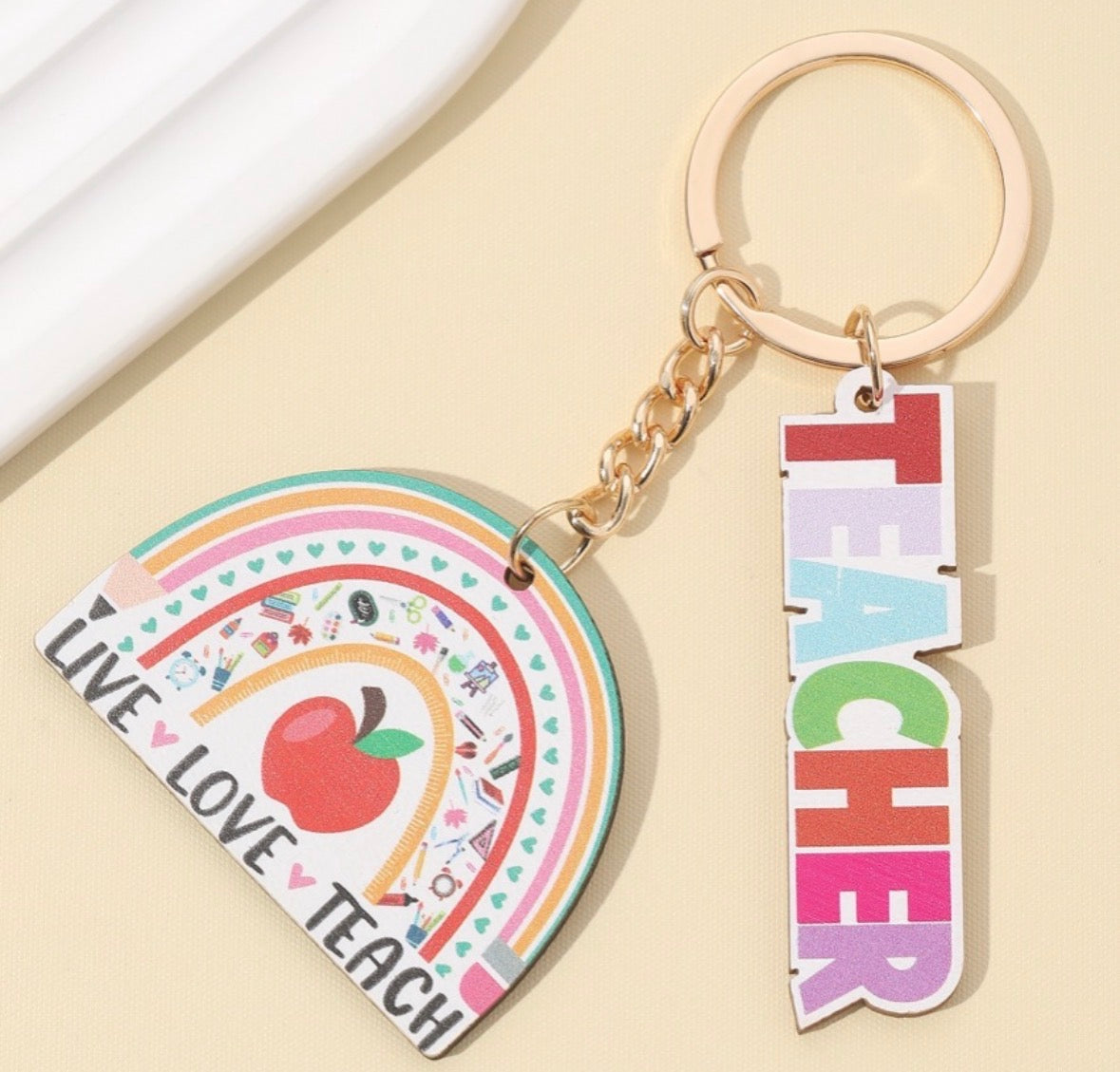 L142 Llavero teacher arcoíris madera unisexo