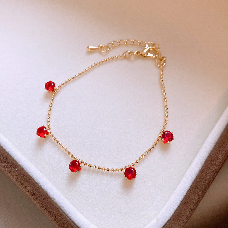 B637 pulsera dorada cristales rojos aleacion 19cm
