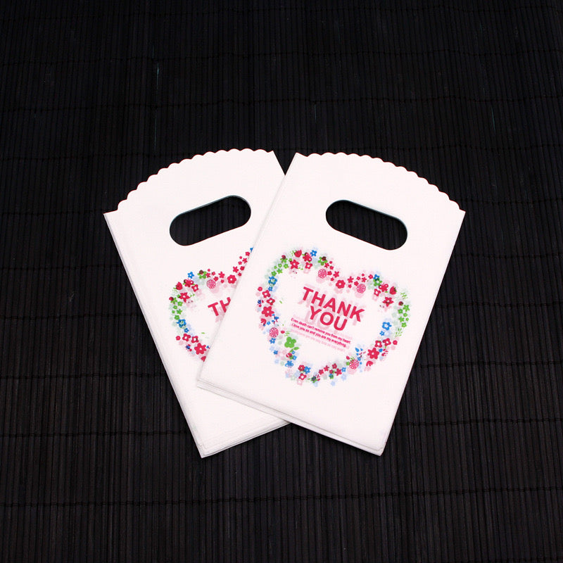 D56 Paquete de bolsas chicas 50 piezas 15x9cm