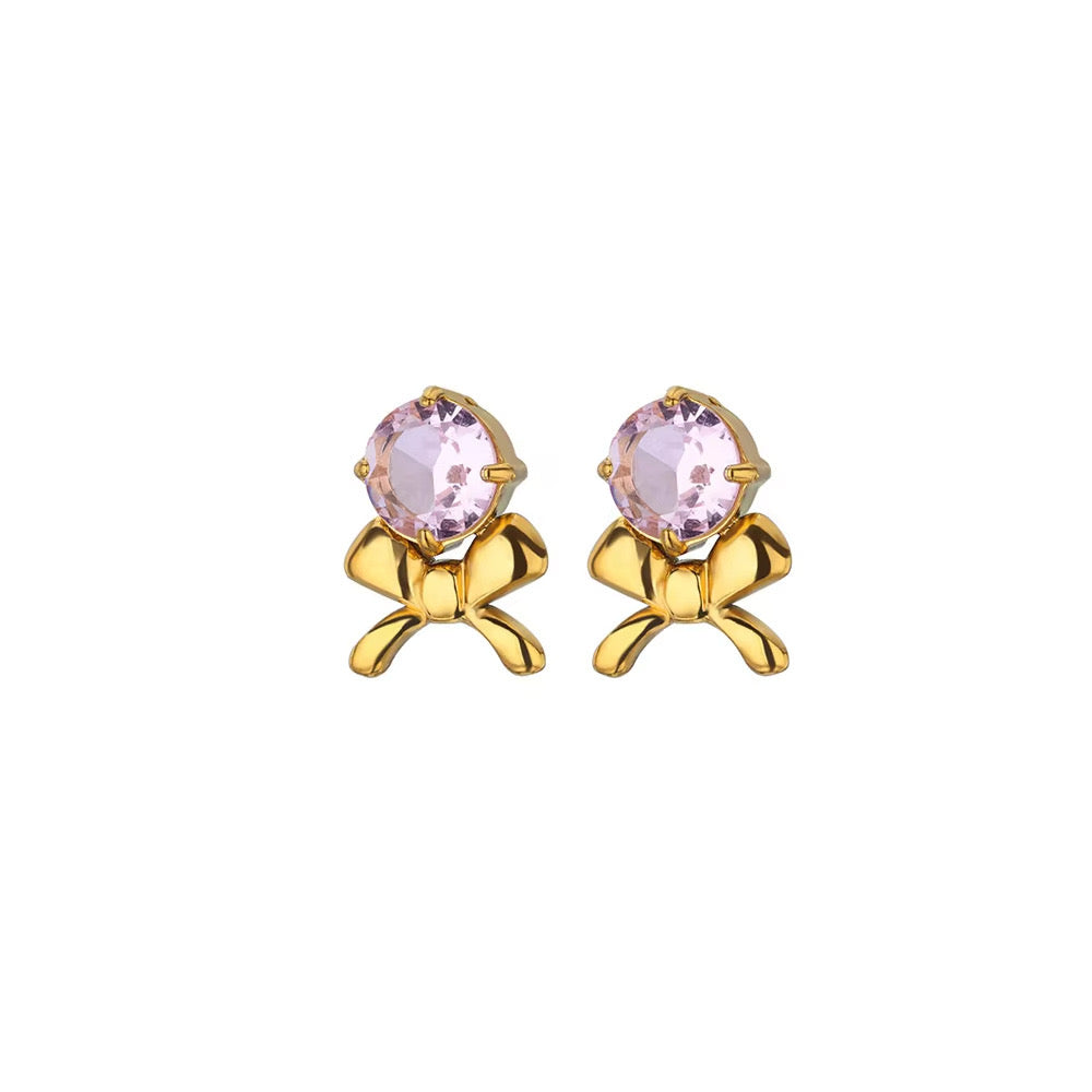 E3443 Aretes moño cristal lila acero inoxidable 1.5cm