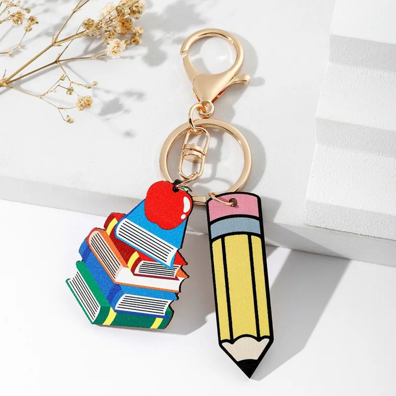 K77 Llavero lapiz libros maestro estudiante madera largo 7cm
