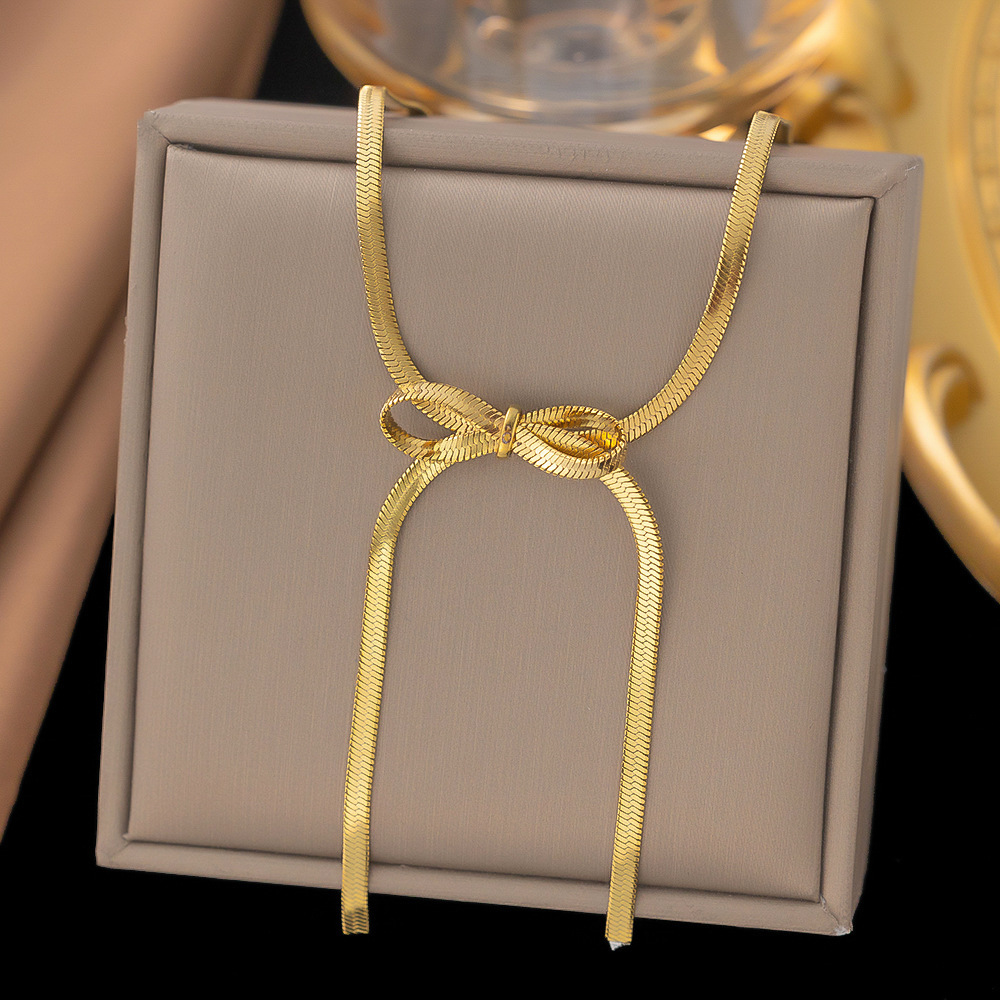 J537 Collar moño dorado elegante acero de titanio largo 15cm