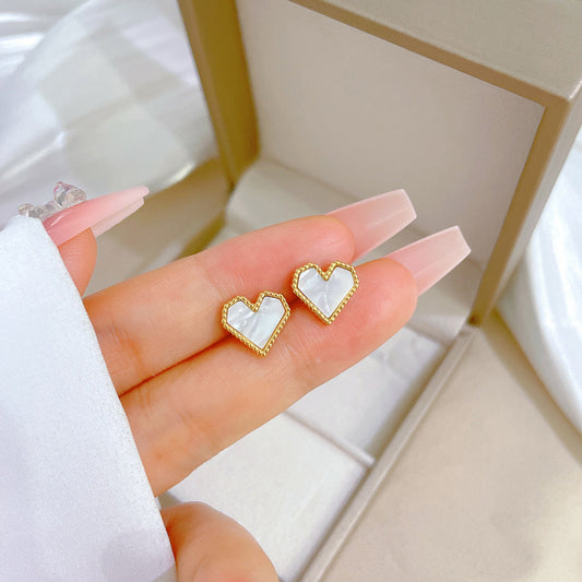 E3447 Aretes corazon blanco acero de titanio 1cm