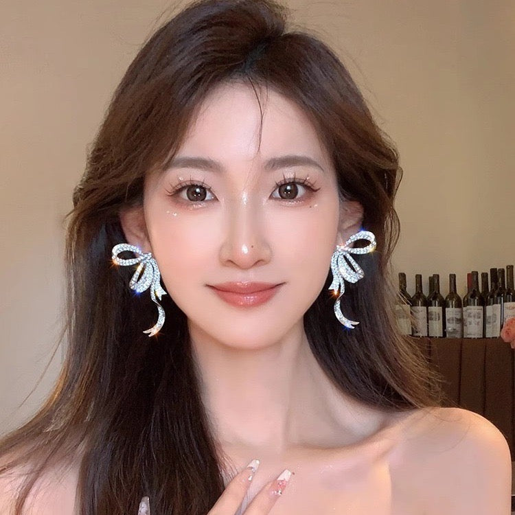 E4487 Aretes moño aleacion 6.5cm