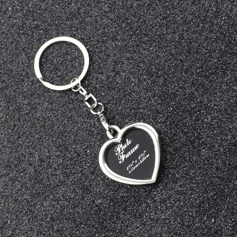 K125 Llavero corazon porta retrato plateado 4cm