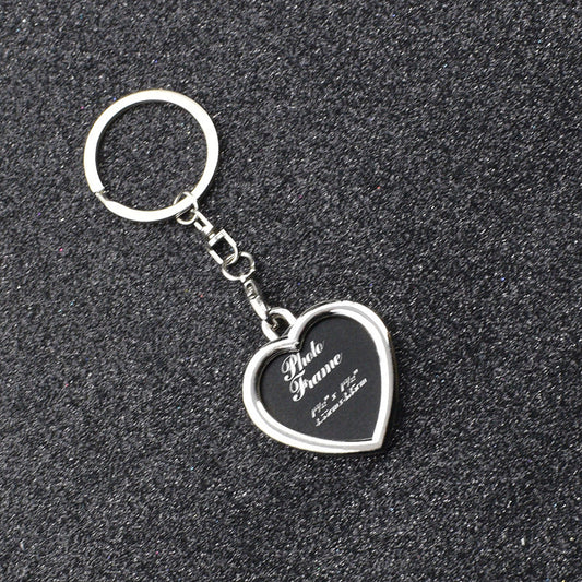 K125 Llavero corazon porta retrato plateado 4cm