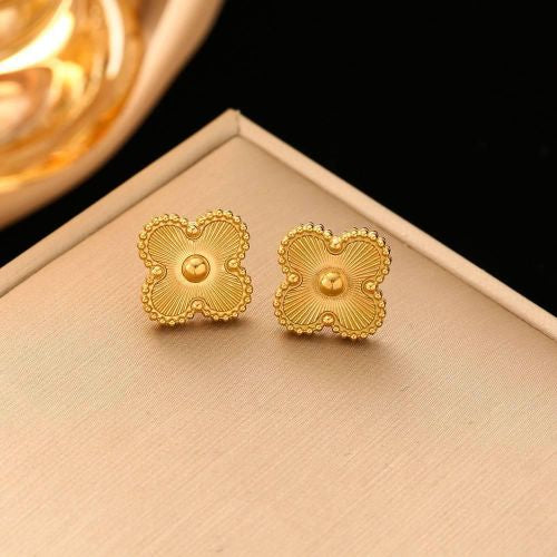 E3204 Aretes flor dorada acero de titanio 1cm