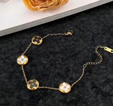 J541 Pulsera dorada flores blanco y negro acero inoxidable chapado en oro 18k 23cm