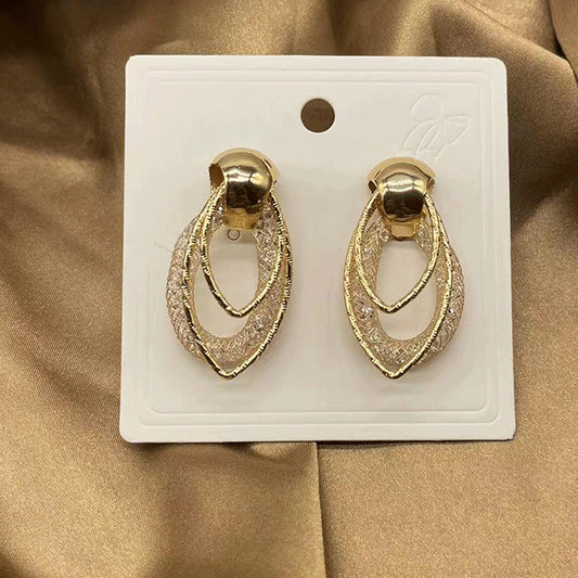 E3407 aretes óvalo dorado aleacion 4cm