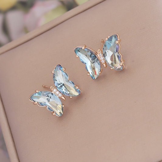 E3628 aretes mariposa azul cristal brillante cobre 2cm