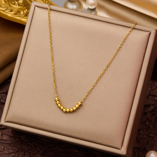 C1540 Collar circulos dorados acero inoxidable 21cm