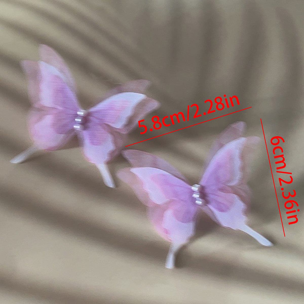 E3366 Aretes mariposa  morada fibra sintetica 3cm