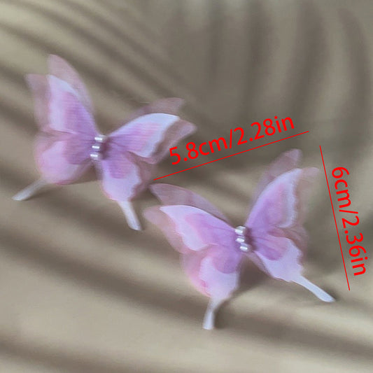 E3366 Aretes mariposa  morada fibra sintetica 3cm