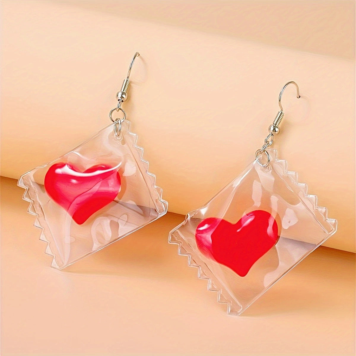 E2243 Aretes bolsa corazon de te dentro 6cm