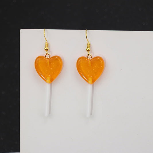E2321N Aretes paleta corazon resina gancho 6.5cm