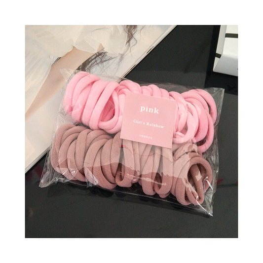 ACS02  Ligas para el cabello rosas incluye 50 piezas