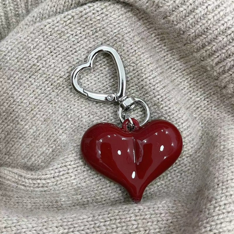 K49 Llaveeo corazon acrilico