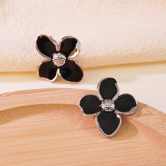 E6071 Aretes flor negra plateada acero inoxidable 4cm
