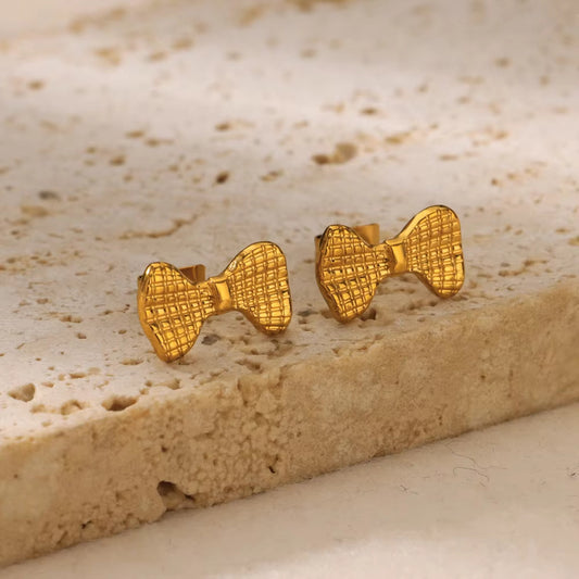 E2915 Aretes moño acero inoxidable chapado en oro 18k ancho 0.7 x 1.5cm