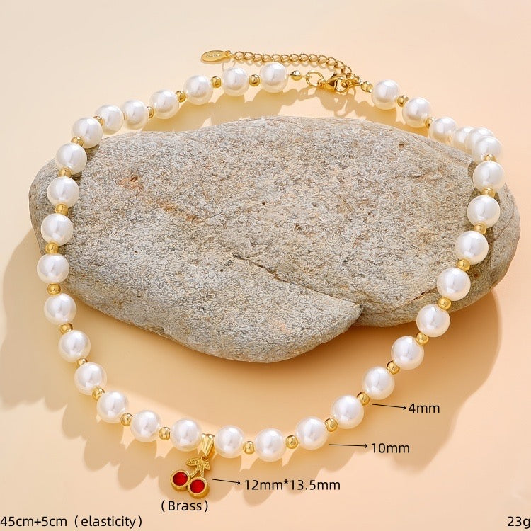 C651 Collar perlas cereza acero inoxidable dije cobre largo 24cm dije 1.5cm
