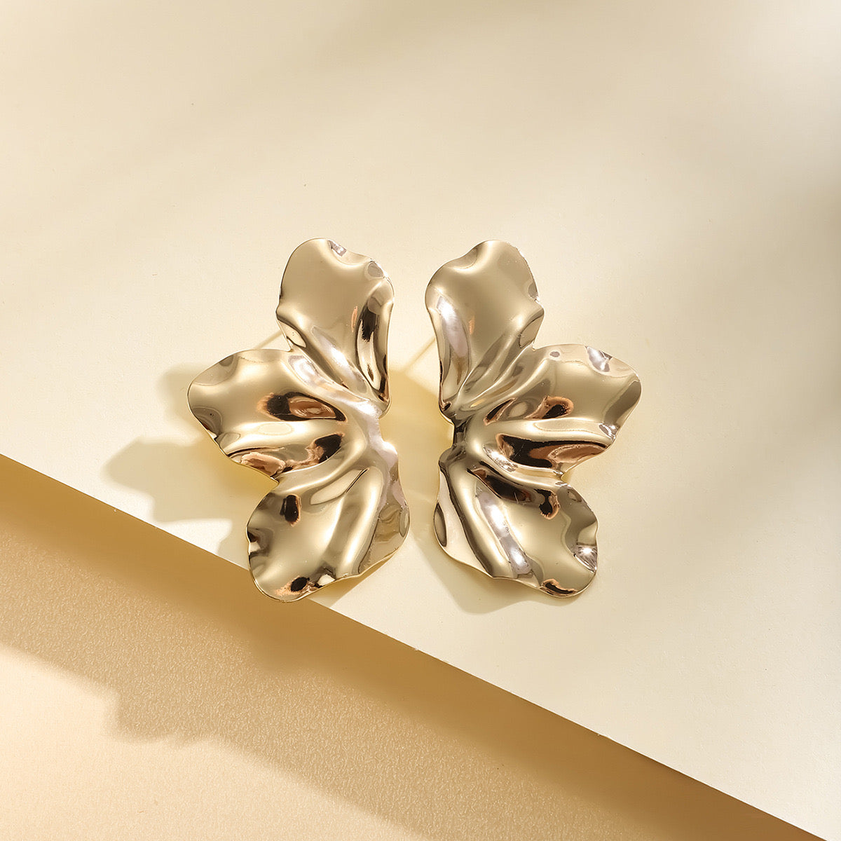 E4974 Aretes pétalos dorados aleacion 5cm