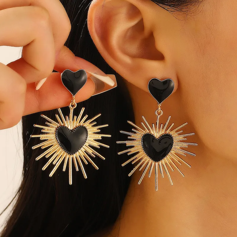 E2096B Aretes Corazon Negro Sol Aleacion