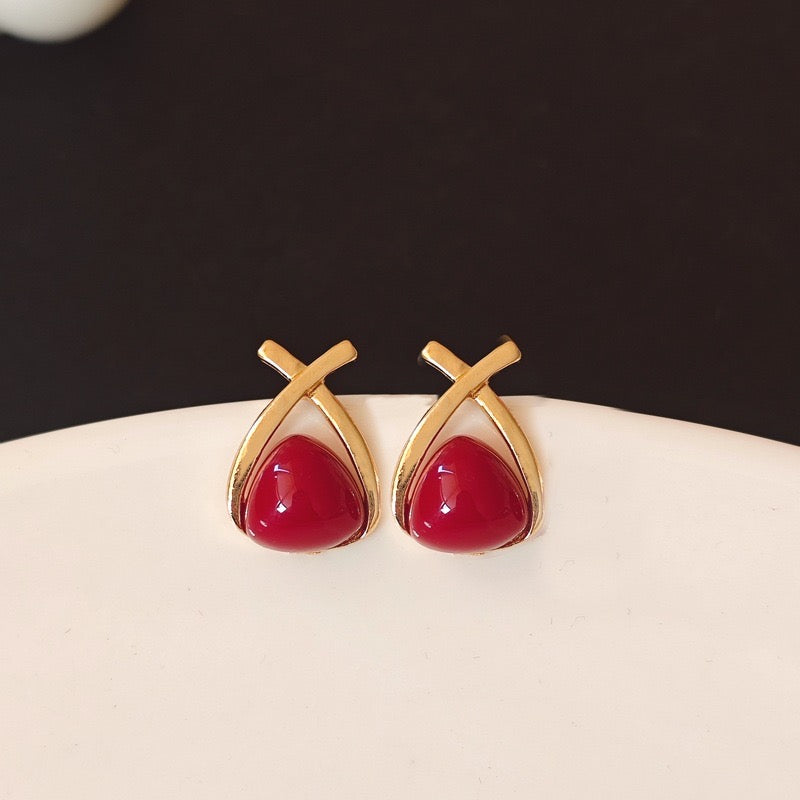 E4912 Aretes brillantes perla roja aleacion 1.5cm