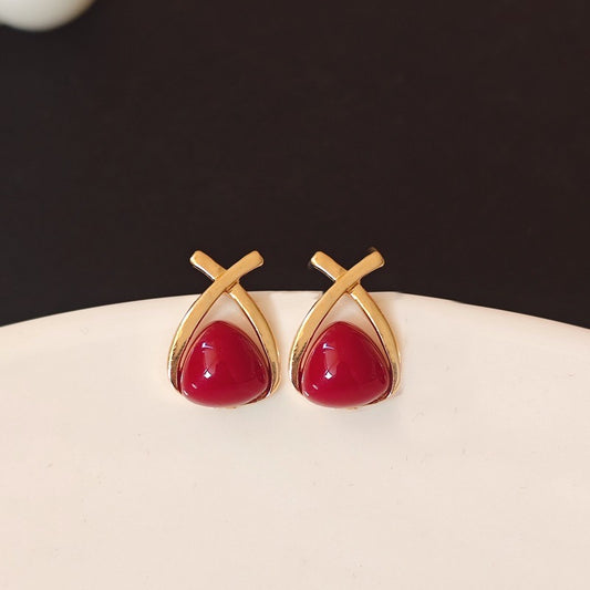 E4912 Aretes brillantes perla roja aleacion 1.5cm