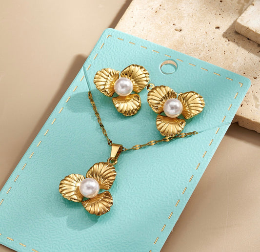 E1256 conjunto de collar y aretes flor dorada acero inoxidable