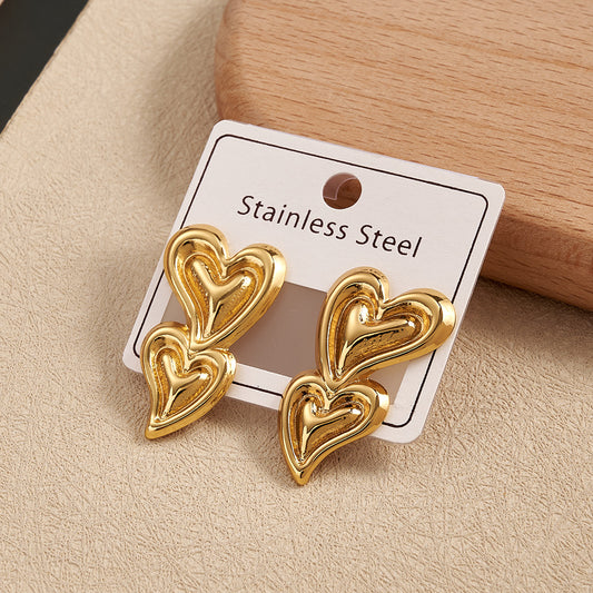 E4319 Aretes corazones dorados acero inoxidable 3cm
