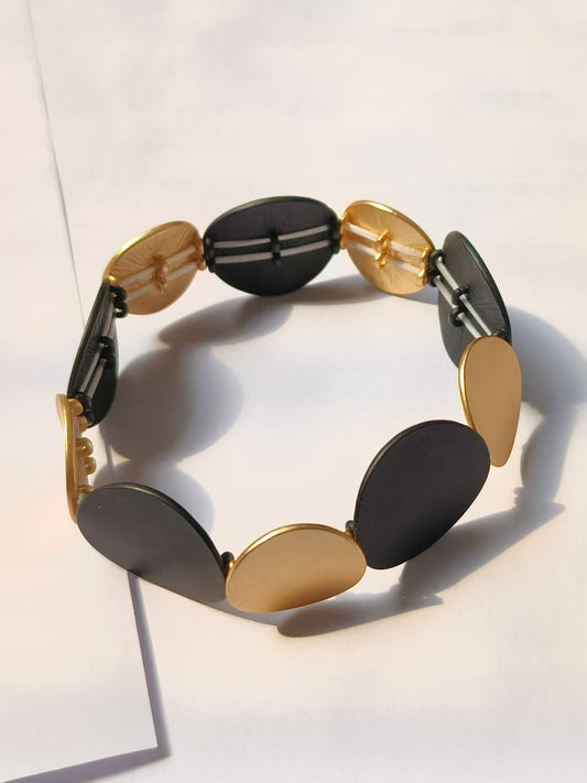 B409 Brazalete negro y dorado aleacion elástico