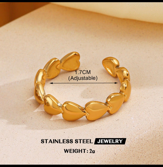A577 anillo corazones pequeños dorados acero inoxidable abierto