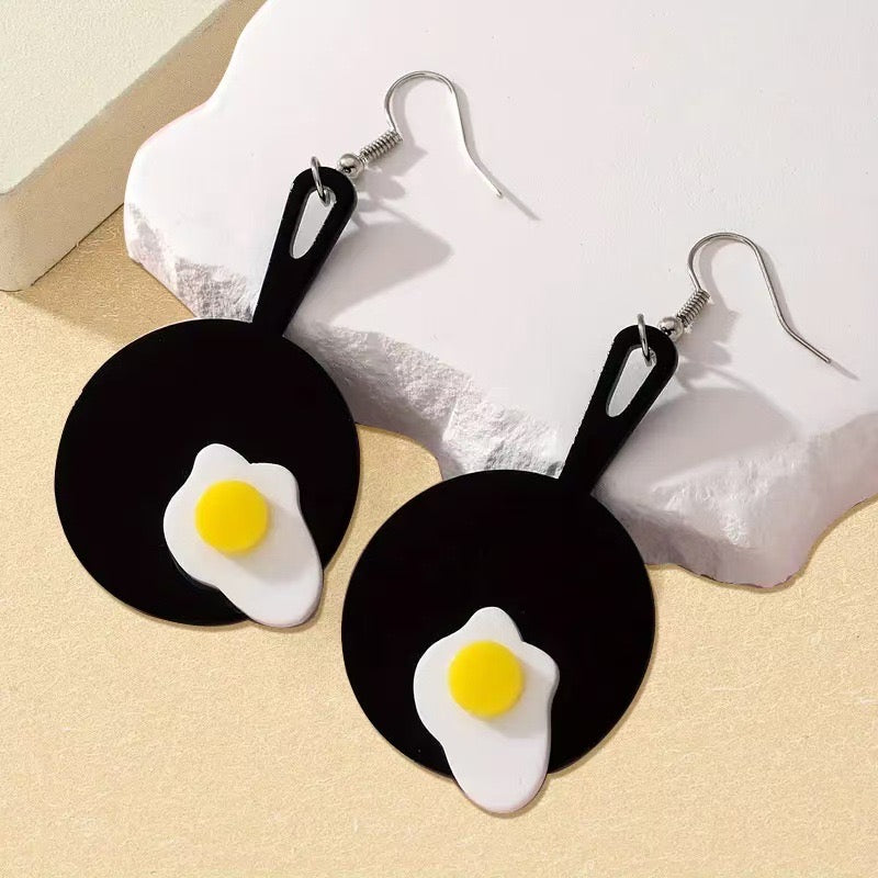 E7261 Aretes huevos acrilico 7.5cm