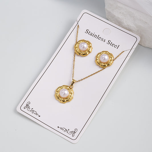 C893 Conjunto de aretes y collar círculo dorado y perla acero inoxidable 21cm largo 1.8cm dije 1.8cm aretes