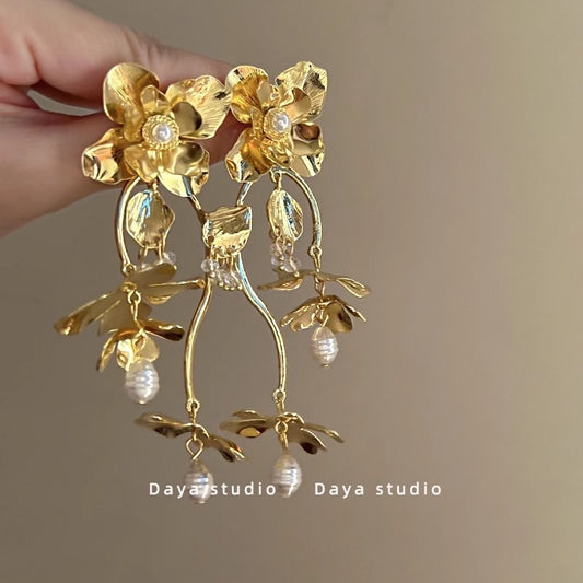 E7316 Aretes maxi flores perla aleacion 10cm