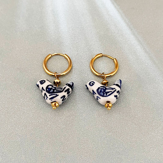 E4698 Aretes pájaro acero inoxidable en cerámica 3cm