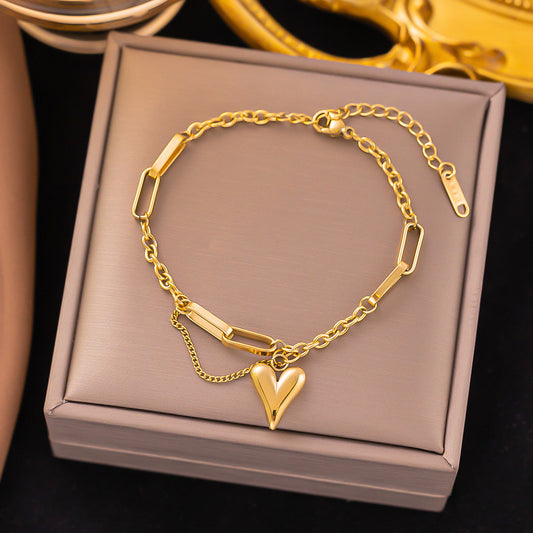 B393 Pulsera corazon acero inoxidable chapado en oro 18k 21cm