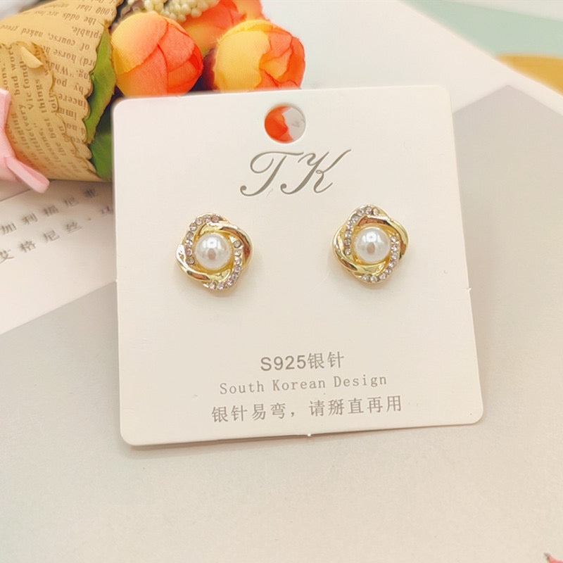 E5801 Aretes perla contorno brillante aleacion 1cm