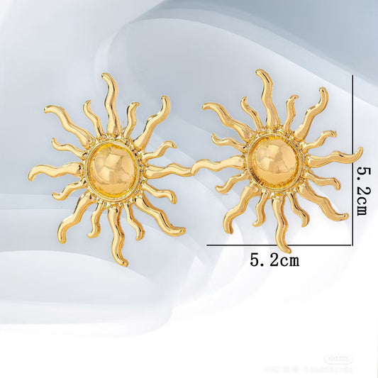 E3494 Aretes sol dorado Hierro 5cm