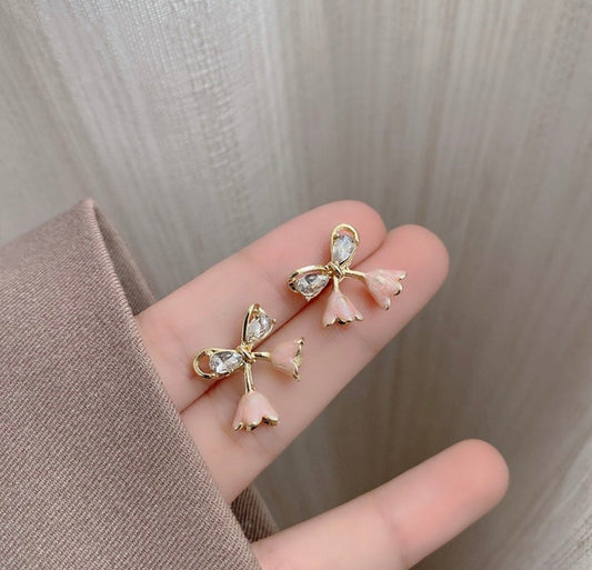 E5426 Aretes moño rosado aleacion 1.5cm