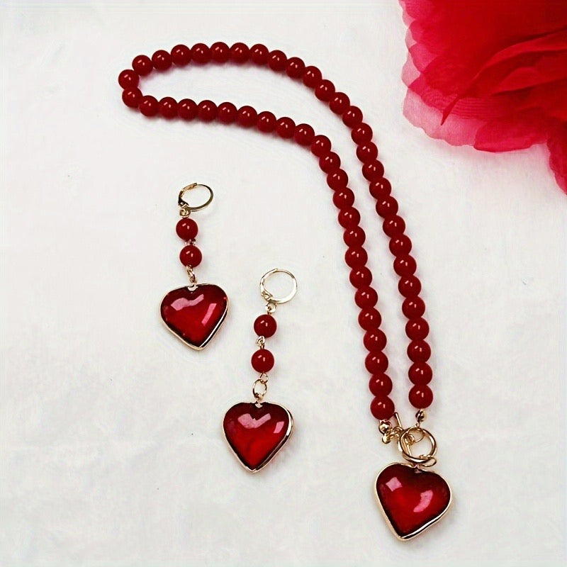 C262 Juego collar corazon aretes perlas rojas largo 23cm corazon 2cm Aretes 7cm