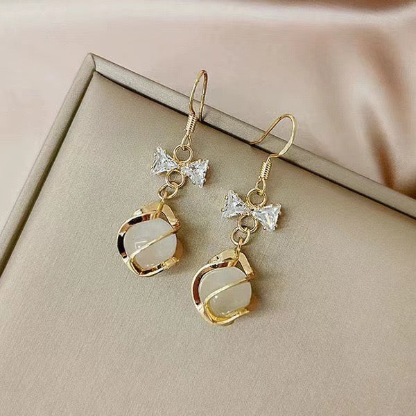 E5841 Aretes esfera moño brillante aleacion 3cm