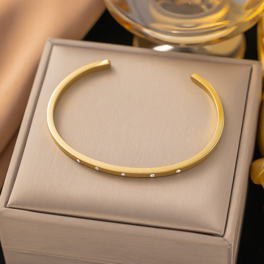 B466 Brazalete dorado acero inoxidable chapado en oro de 18k