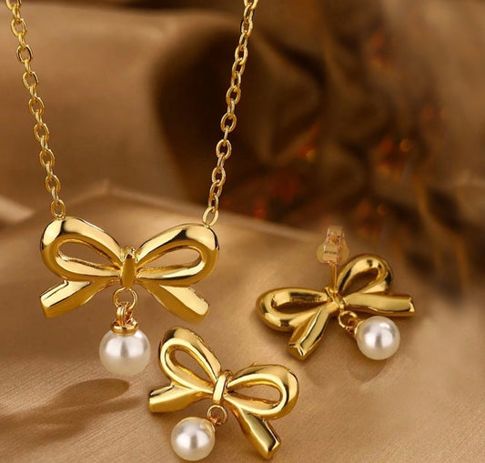 C1463 Conjunto collar aretes moño dorado perla acero inoxidable 20cm, dije y aretes 2cm