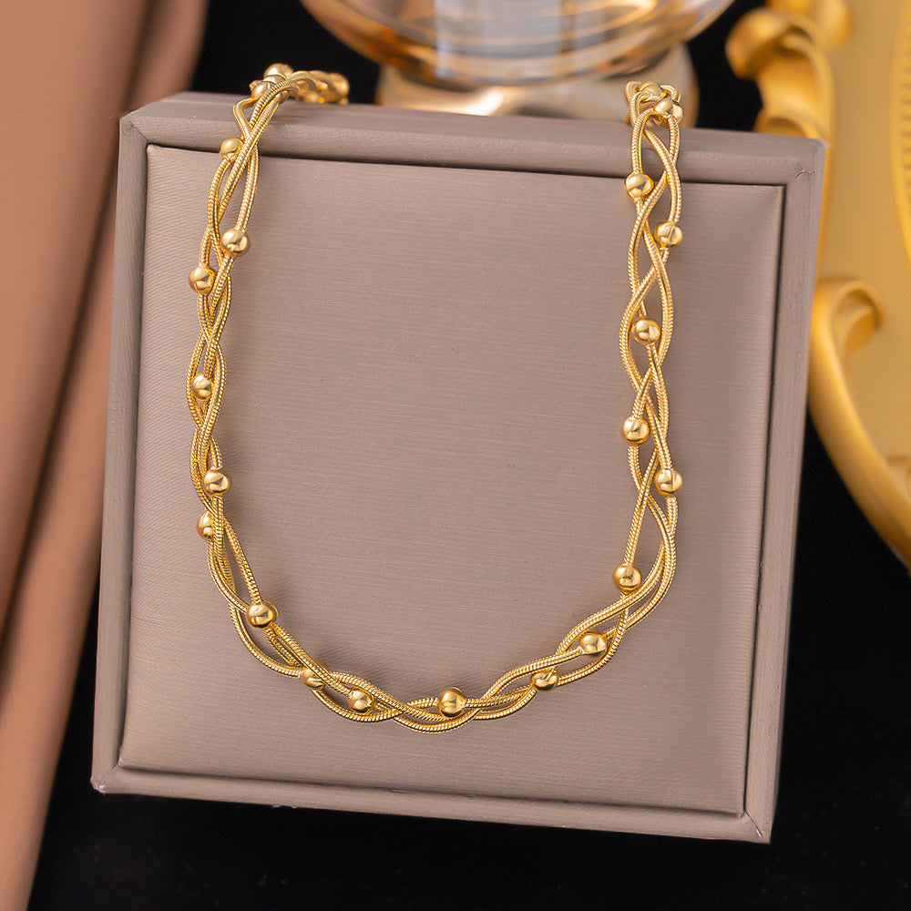 C986 Collar dorado acero titanio 23cm