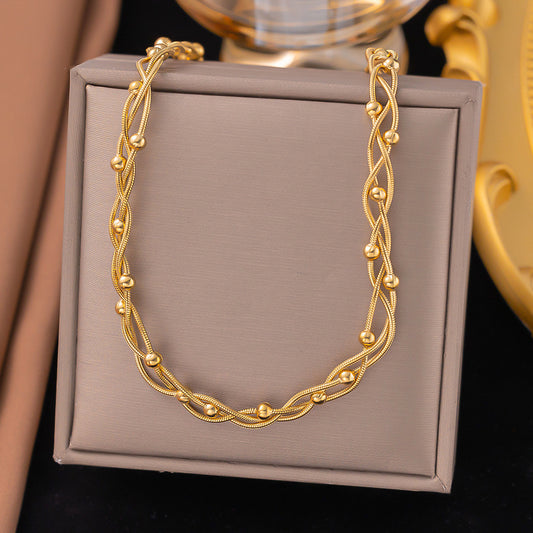 C986 Collar dorado acero titanio 23cm