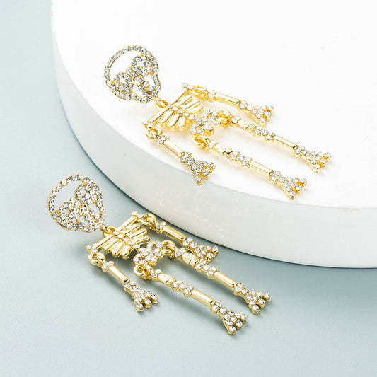 E3879 aretes esqueleto dorado cristal brillante aleacion 6cm